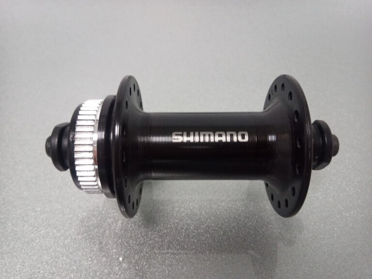 Front hub / 100 MM / Drop axle / Disc (Centerlock) / 32GTS / Shimano / HB-TX505 Tourney / Black / MTB