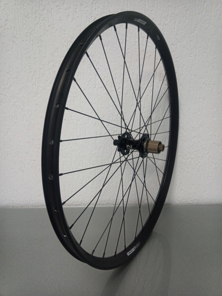 Rear wheel / 622X30C / Rigida - Ryde / Edge M 30 os / Black / Novatec / D462SB-A5A-B12 / HG Body 35 MM  / 148 MM / Disc (6 bolts) / MTB