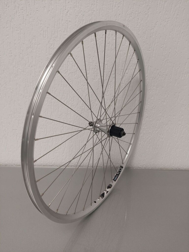 Roue arrière / 622X19C / Rigida - Ryde / Star XS19 / Silver / Kun Teng / Autres / HG Body 31 MM / 135 MM / Frein sur jante / City