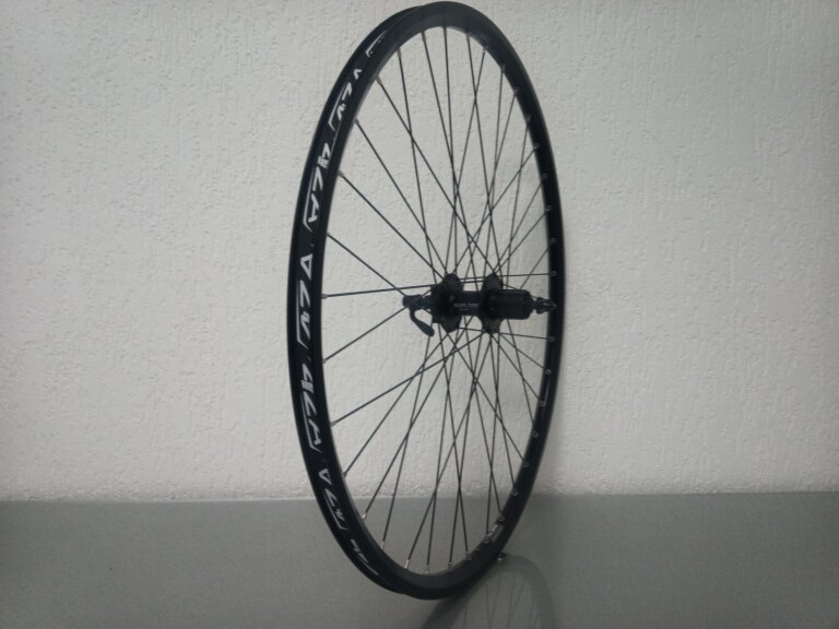 Roue arrière / 622X19C / Rigida - Ryde / ZAC 2000 / Noir / Shimano / FH-M475 Alivio / HG Body 35 MM / 135 MM / Disque (6 boulons) / Tour