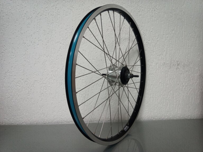 Roue arrière / 559X25C / Rigida - Ryde / Andra 40 / Noir / Shimano / Nexus Inter 7 SG-C3001-7R / 7S / 127 MM / Frein à rouleaux ou Frein sur jante / Cargo