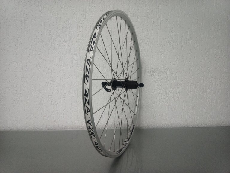 Rear wheel / 559X19C / Rigida - Ryde / ZAC Pro / Silver / Shimano / FH-T4000 Alivio / HG Body 35 MM / 135 MM / Rim brake / MTB - Tour