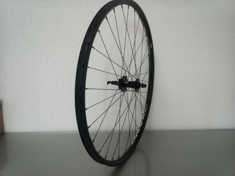 Front wheel / 622X25C / Rigida - Ryde / Trace 25mm / Black / Novatec / D791SB/A /  / 100 MM / Disc (6 bolts) / MTB