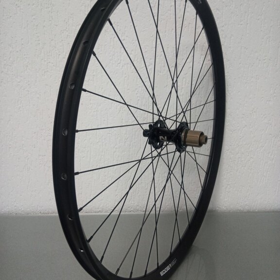 Rear wheel / 622X30C / Rigida - Ryde / Edge M 30 os / Black / Novatec / D462SB-A5A-B12 / HG Body 35 MM  / 148 MM / Disc (6 bolts) / MTB 