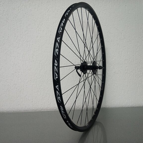 Voorwiel / 622X19C / Rigida - Ryde / ZAC 2000 / Zwart / Shimano / HB-M475 Deore /  / 100 MM / Disc (6 bout) / Tour 