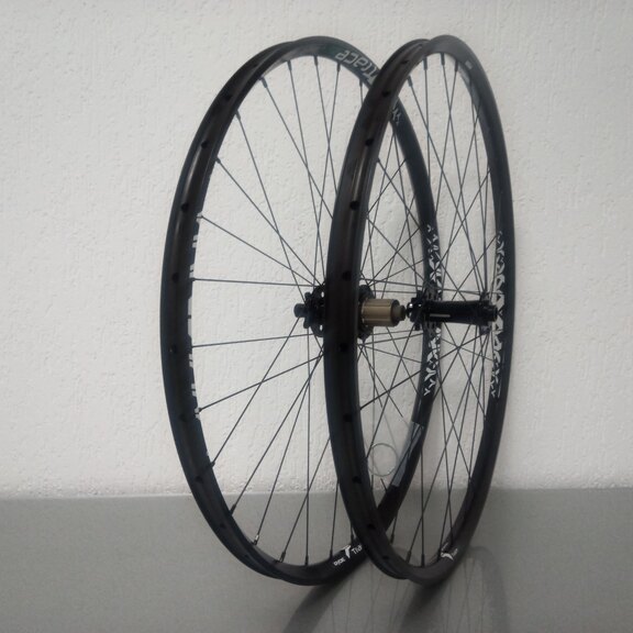 Wielset / 622X25C / Rigida - Ryde / Trace 25mm / Zwart / Novatec / D462SB-A5A-B12 / HG Body 36,85 MM / 148 MM / Disc (6 bout) / MTB 