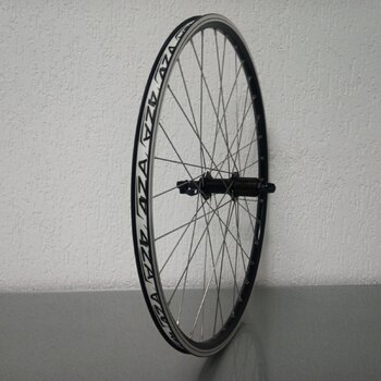 Roue arrière / 559X19C / Rigida - Ryde / ZAC 2000 / Noir / Shimano / FH-T4000 Alivio / HG Body 35 MM / 135 MM / Frein sur jante / VTT - Tour